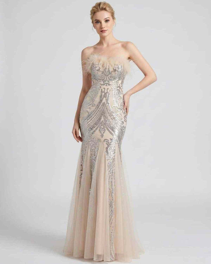 Vestido de gala con plumas y lentejuelas, diseño sirena. Para una noche mágica.