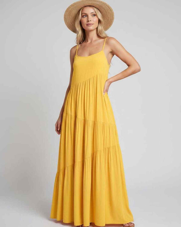 Vestido maxi sin mangas, elegante y chic para eventos de verano.