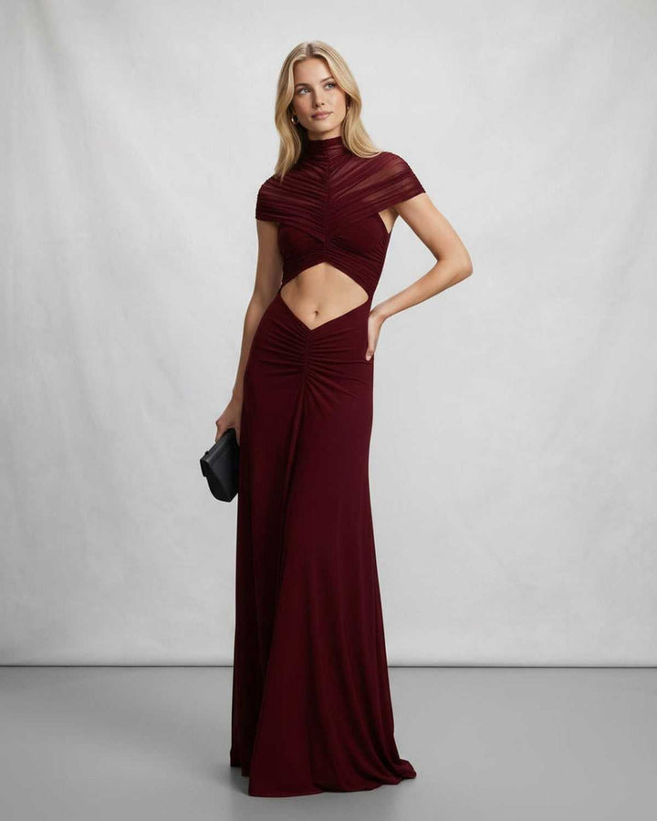 Vestido formal femenino y elegante, maxi, con cuello alto y favorecedor corte en la cintura para eventos.