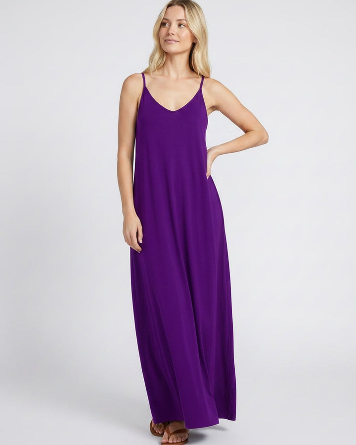 Elegante vestido maxi de verano con escote V y bolsillos, ideal para cualquier ocasión.