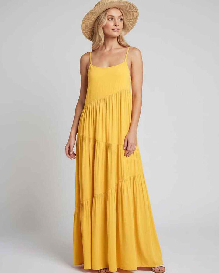 Vestido de verano fluido, perfecto para disfrutar de la playa.