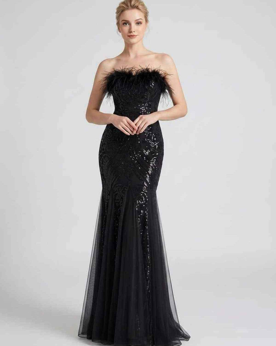 Vestido de fiesta con lentejuelas y plumas, sin mangas, para una velada inolvidable.