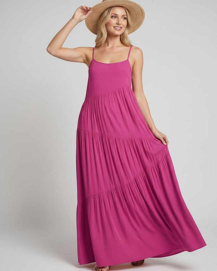 Vestido de fiesta fluido, perfecto para noches cálidas.
