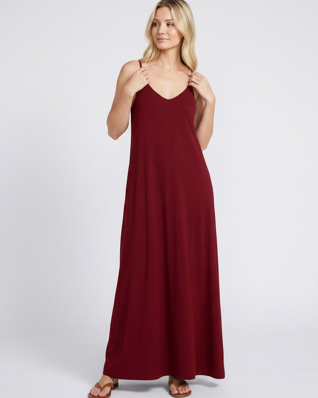 Vestido de vacaciones: maxi, sin mangas, escote V, con bolsillos, estilo chic.