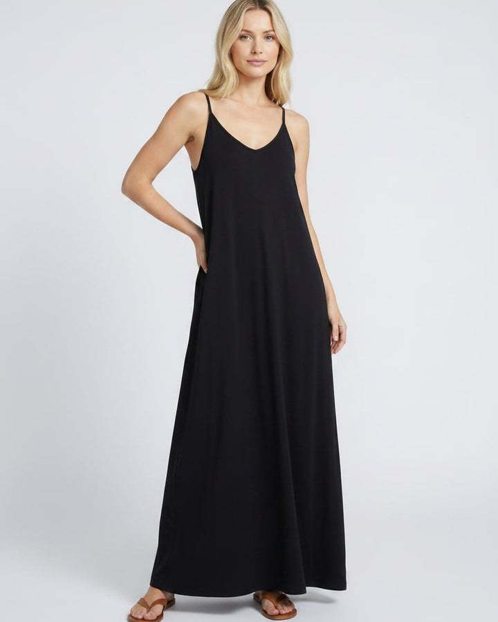 Vestido veraniego casual con escote V, sin mangas y bolsillos, ideal para la playa.
