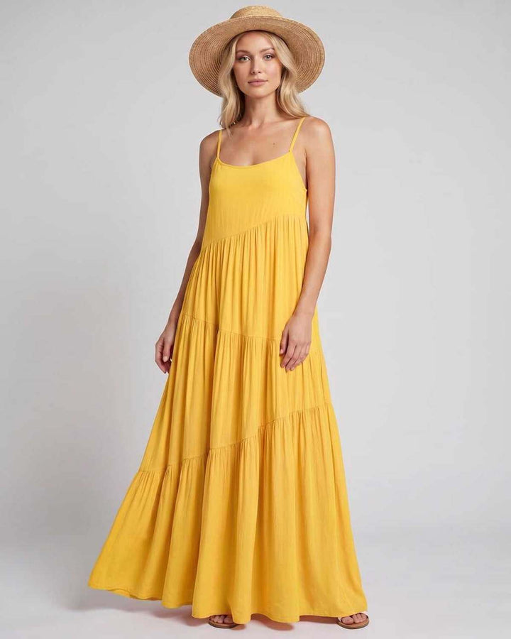 Vestido de playa fluido para mujer, esencial para tus vacaciones.