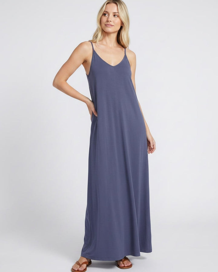 Vestido veraniego de mujer, escote V, sin mangas, bolsillos, perfecto para la ciudad.