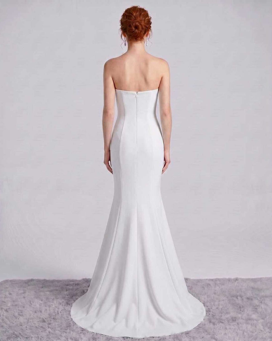 Vestido largo de fiesta para mujer, sin mangas, con corte sirena y toque elegante.