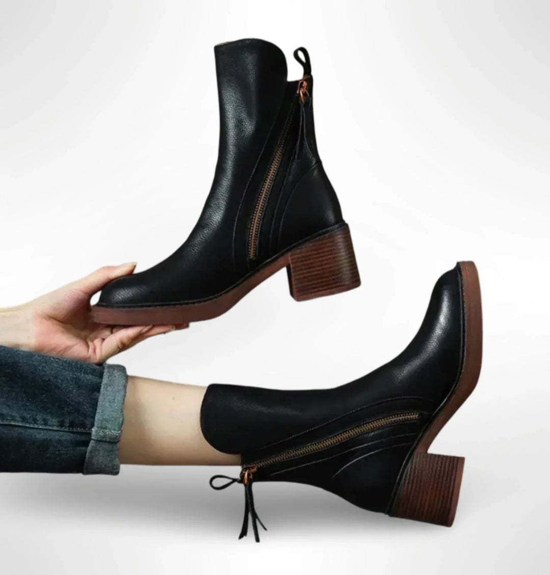 Botines negros elegantes de mujer, piel sintética, cremallera lateral. Ideales para otoño/invierno.