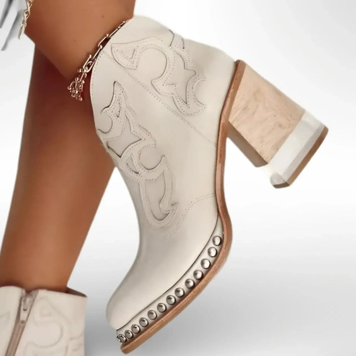 Botas de mujer Nerina estilo bohemio, bordado floral, piel sintética de confort y tacón bajo.