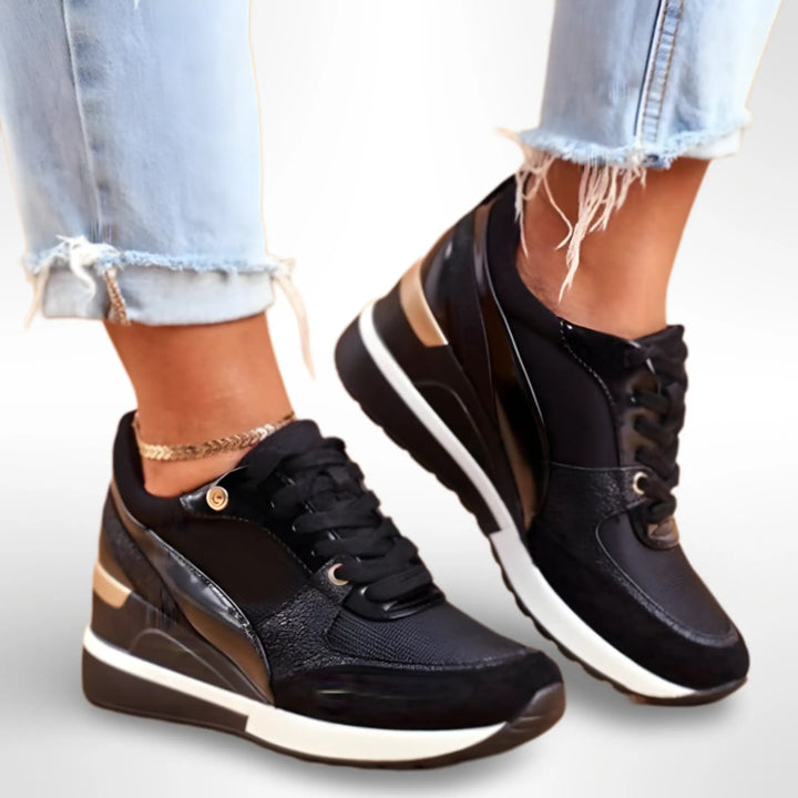 Par de zapatillas ortopédicas mujer, en vista lateral, destacando su diseño ligero y tejido transpirable.