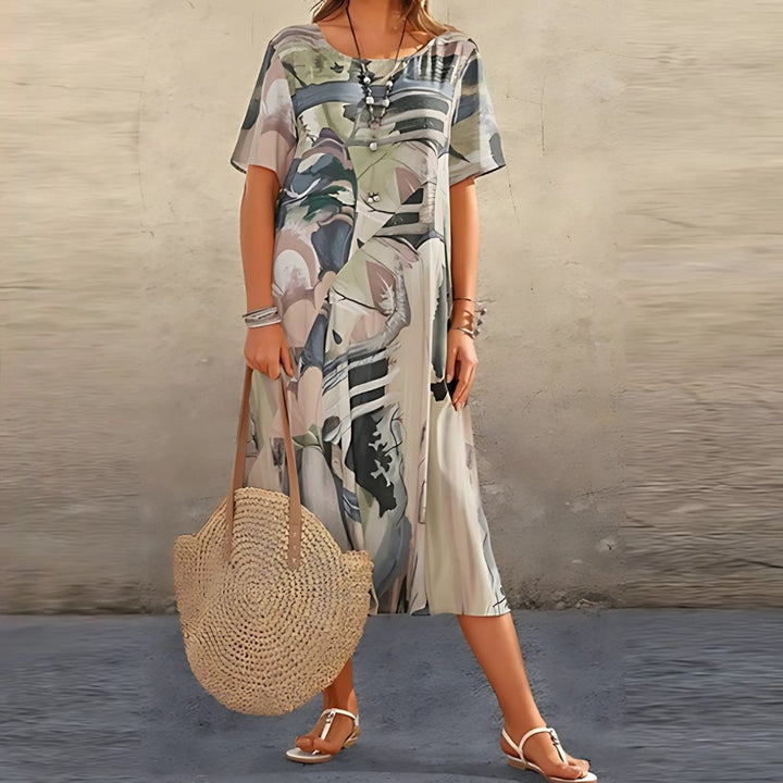 Diseño de moda: Vestido largo talla grande con estampado abstracto. Ropa femenina cómoda y versátil para cualquier ocasión.