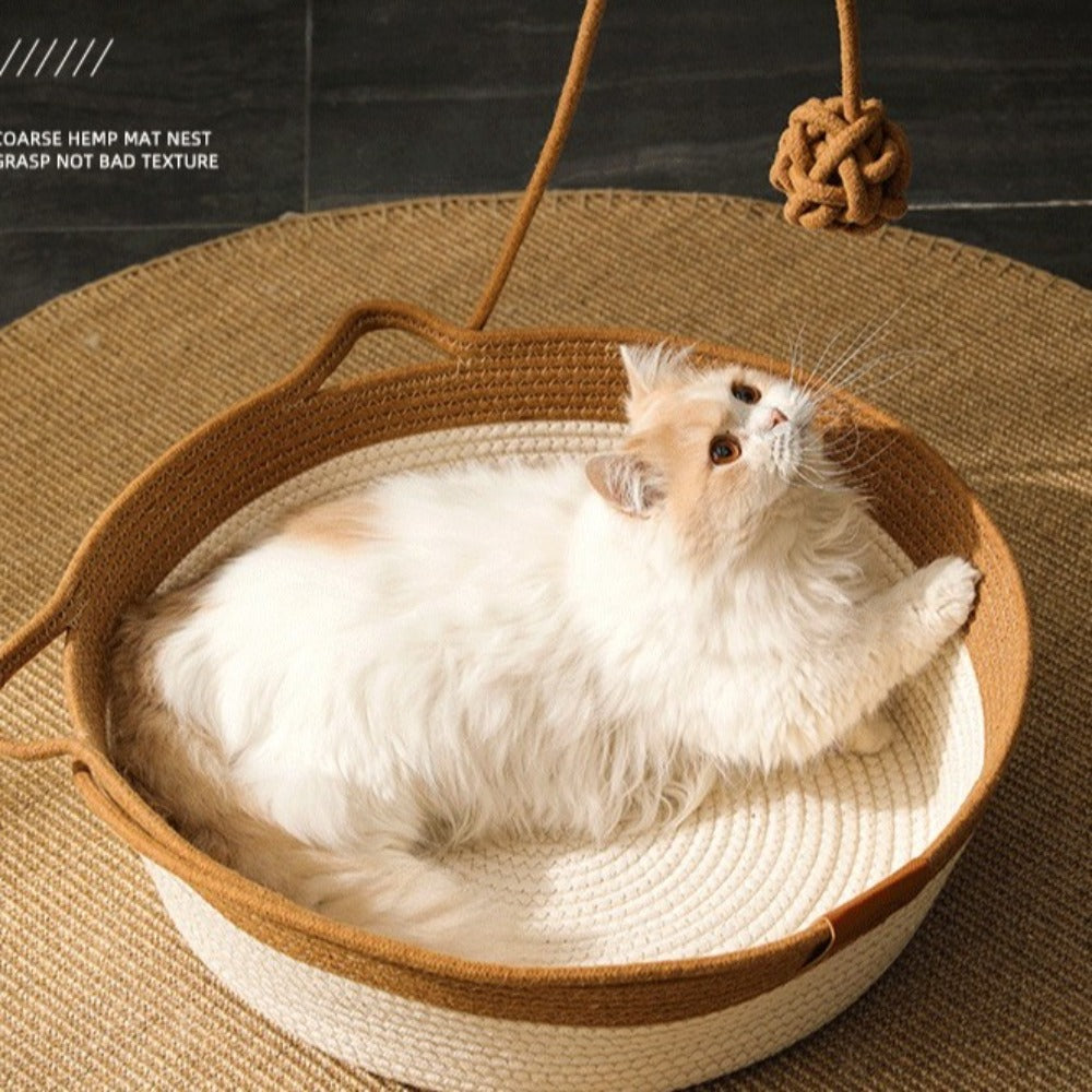 Cama para gatos de cuerda de algodón, hecha a mano, elegante y duradera, ofreciendo confort felino.