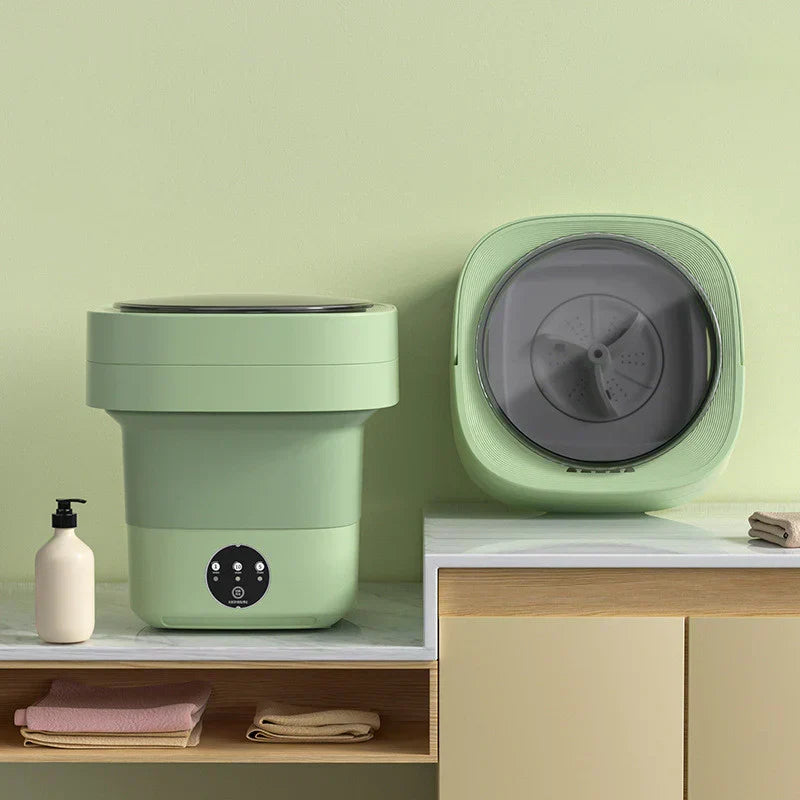 Lavadora portátil plegable compacta para ropa, ideal para apartamentos pequeños y fácil de guardar.