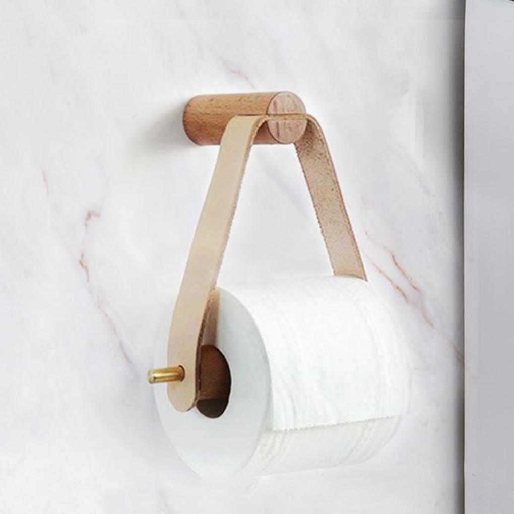 Soporte de papel higiénico minimalista de roble y cuero sintético para baño moderno.