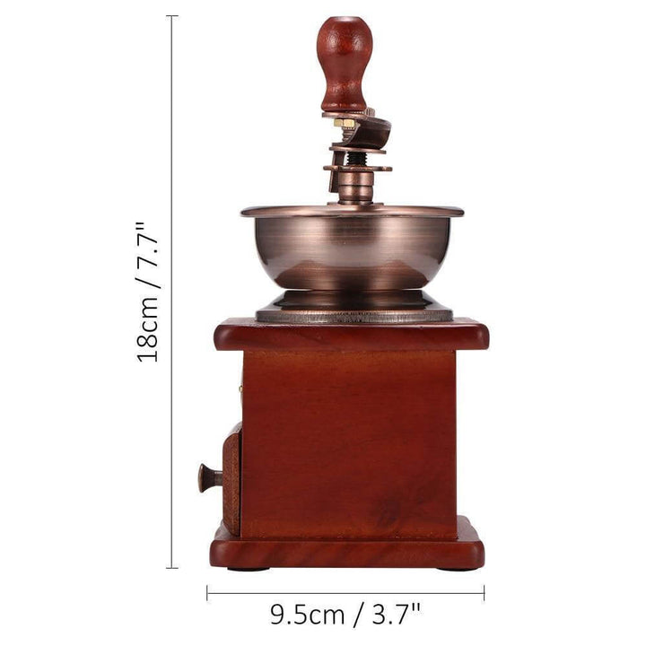 Manivela robusta del molino de café manual vintage, lista para moler granos y liberar su aroma.
