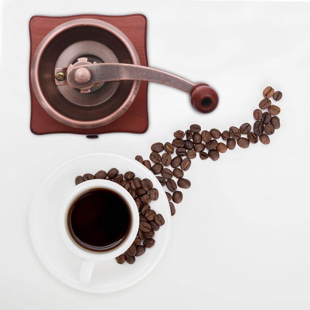 Encantador molino de café manual retro, que aporta el sabor del café fresco a tu hogar.
