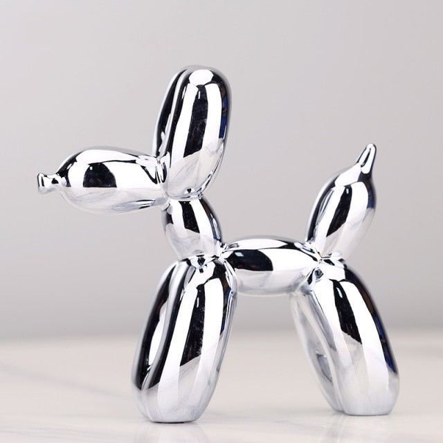 Elegante escultura de perro de globo con acabado metálico. Arte contemporáneo para tu hogar.