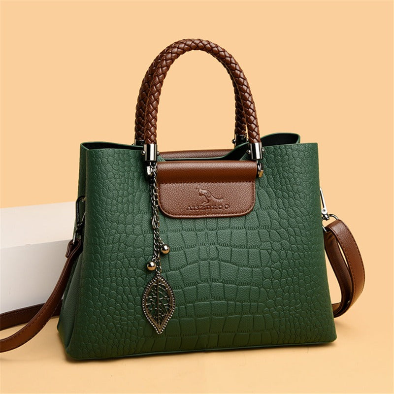Bolso de cuero para mujer, bandolera, estilo elegante y funcional, con correa ajustable.