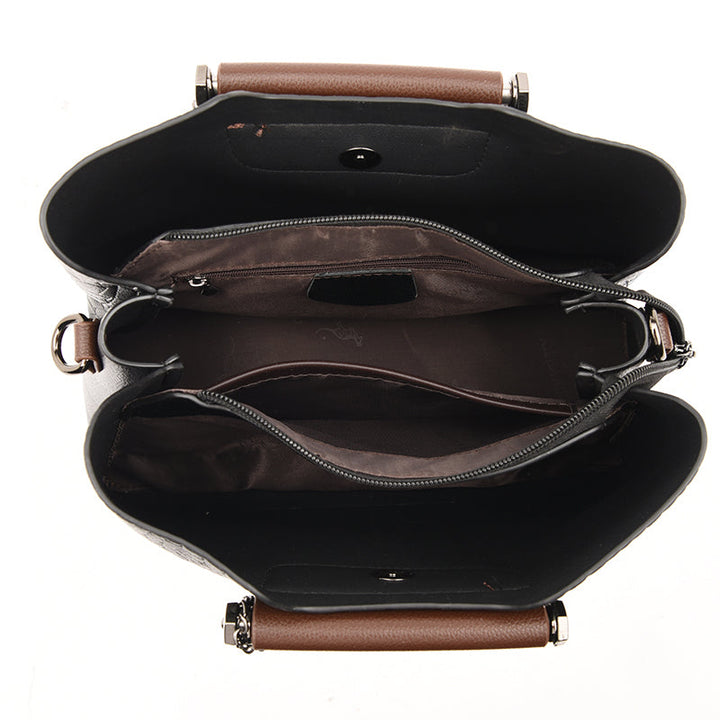 Bolso de cuero negro, estilo bandolera para mujer, correa ajustable, ideal para uso diario.