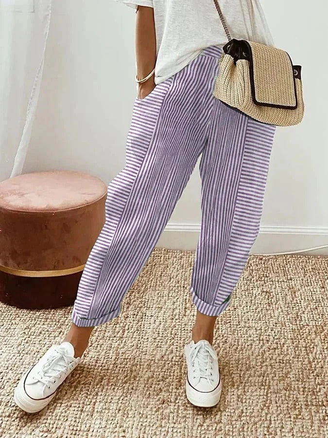 Pantalón de verano fluido de lino a rayas para mujer. Modelo transpirable y relajado con cintura ajustable, muy cómodo.
