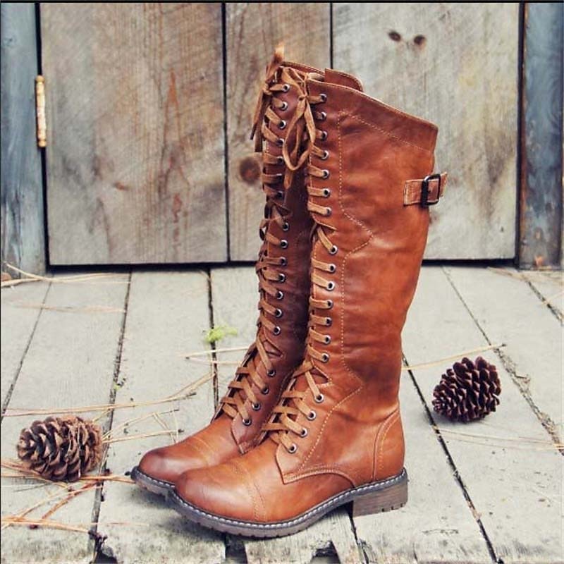 Botas altas de mujer con cordones negras, estilo ecuestre, ideales para moda femenina elegante y cómoda.