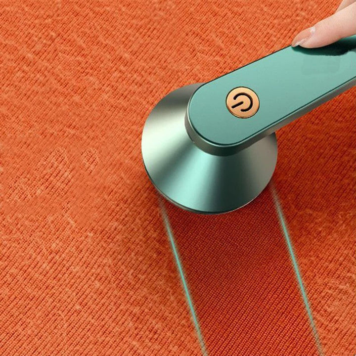 Eliminador de pelusas eléctrico portátil para todo tipo de tejidos: suéteres, abrigos y mantas.