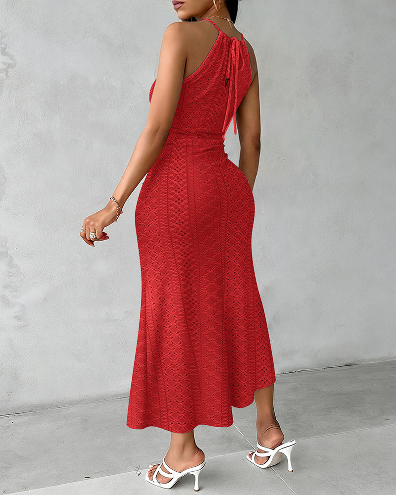 Vestido midi sin mangas con abertura y escote halter, ideal para mujer.
