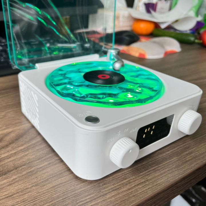 Altavoz retro con sonidos para dormir y proyector, ideal para relajación y ambiente.