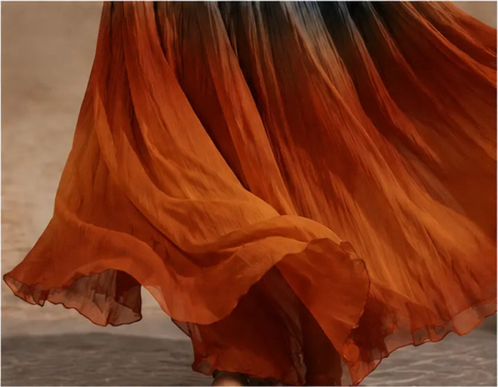 Vestido largo de mujer con escote V degradado, estilo boho chic, sin mangas, perfecto para celebraciones veraniegas.