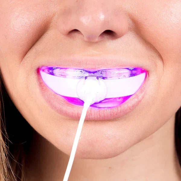 Dispositivo de terapia de luz oral para encías sanas y reducir la sensibilidad dental.