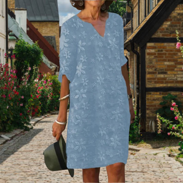 Vestido floral para mujer con estampado vibrante, escote V y manga 3/4. Estilo versátil de primavera.