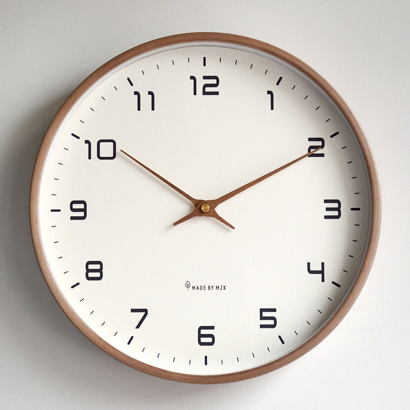Reloj de pared minimalista de madera. Diseño redondo con mecanismo de cuarzo ultra silencioso. Perfecto para hogar.