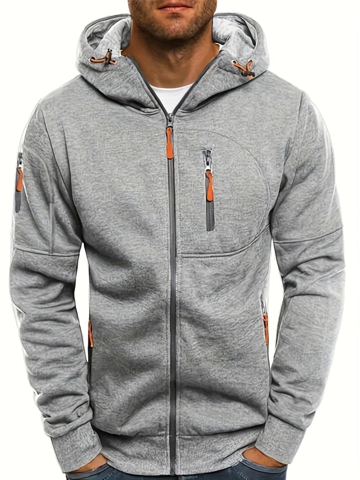 Sudadera de hombre con capucha, cremallera y bolsillos seguros para un look casual de invierno.