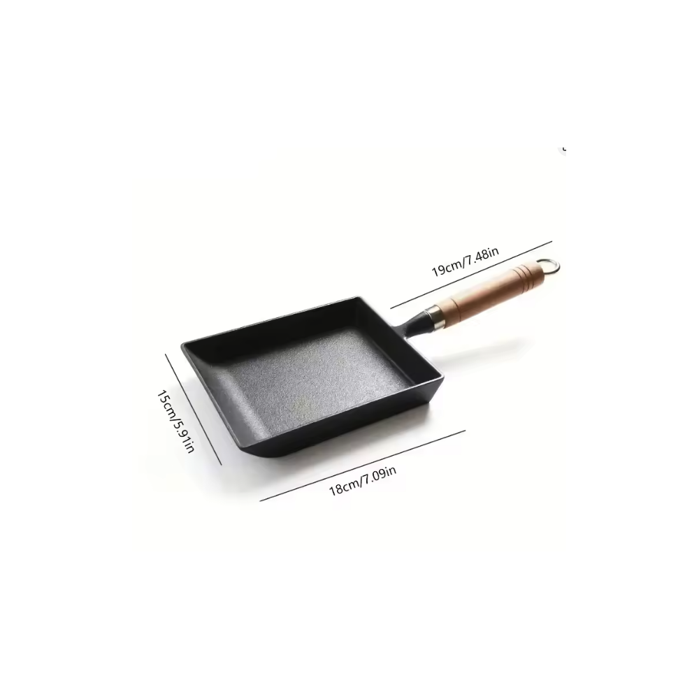 Sartén de hierro fundido para tamagoyaki, esencial en cocina japonesa. Para chef y hogar, duradera y versátil.