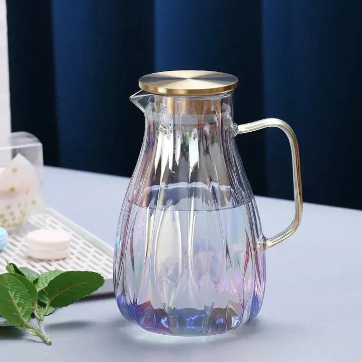 Set de jarra de vidrio transparente y vasos a juego con tapa de acero inoxidable. Para servir bebidas.