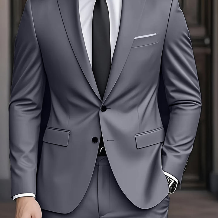 Traje gris slim fit para eventos formales, estilo moderno y sofisticado de hombre.