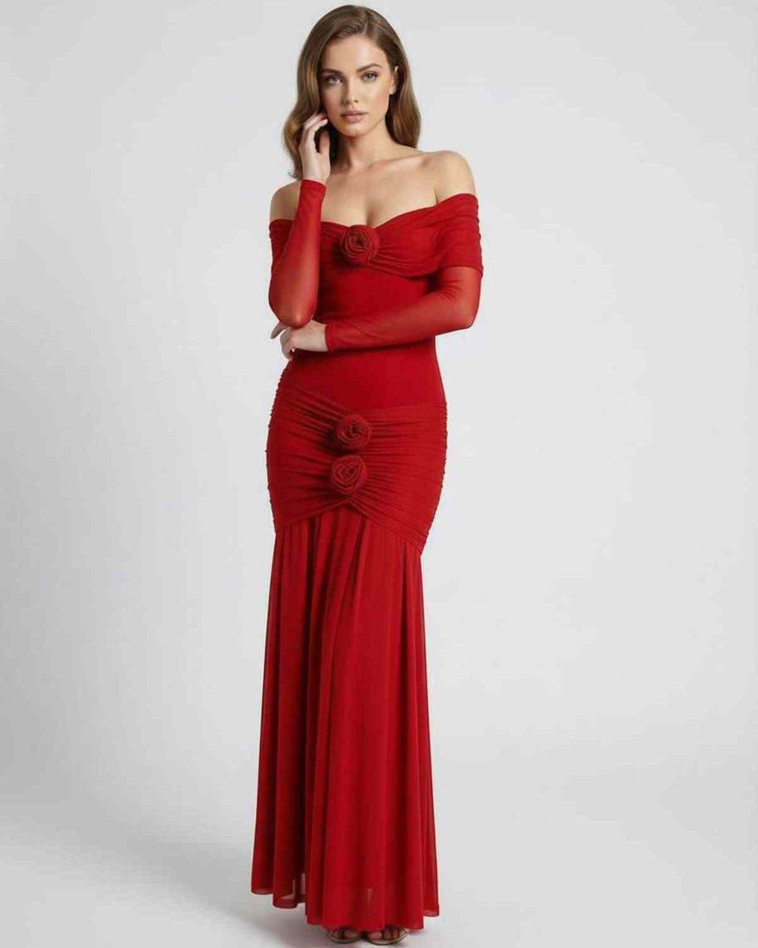 Elegante vestido maxi rojo con mangas largas y escote off-shoulder, perfecto para eventos formales.