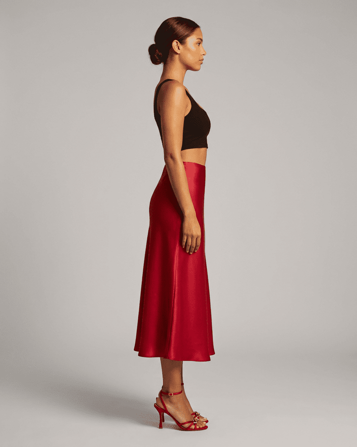 Falda midi roja Rosalia con forma de sirena, un must-have en moda mujer. Diseño formal y elegante de cintura alta.