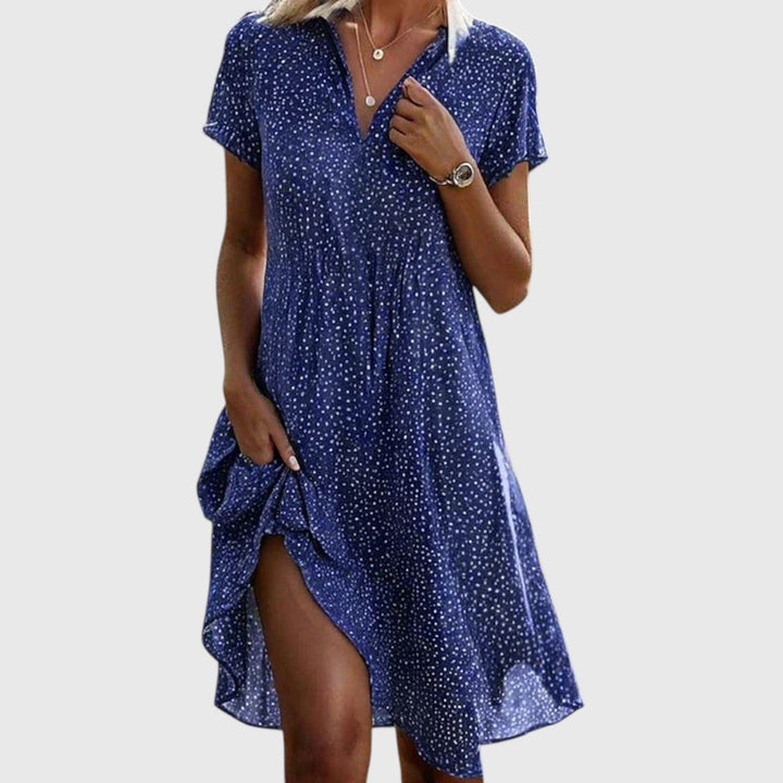 Elegante vestido midi de verano para mujer con cuello V. Estilo casual, fluido y cómodo. Perfecto para el día a día.