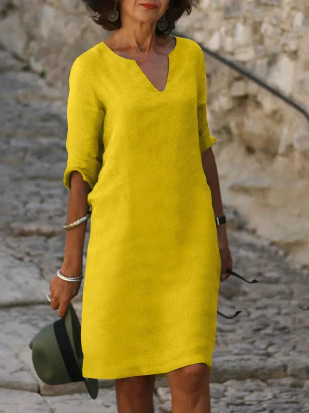 Vestido de fiesta largo de poliéster con escote en V. Elegante para invitadas de boda o eventos formales.