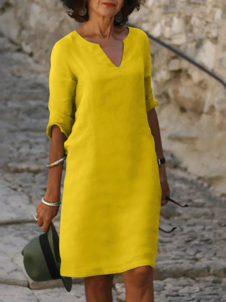 Vestido de fiesta largo de poliéster con escote en V. Elegante para invitadas de boda o eventos formales.