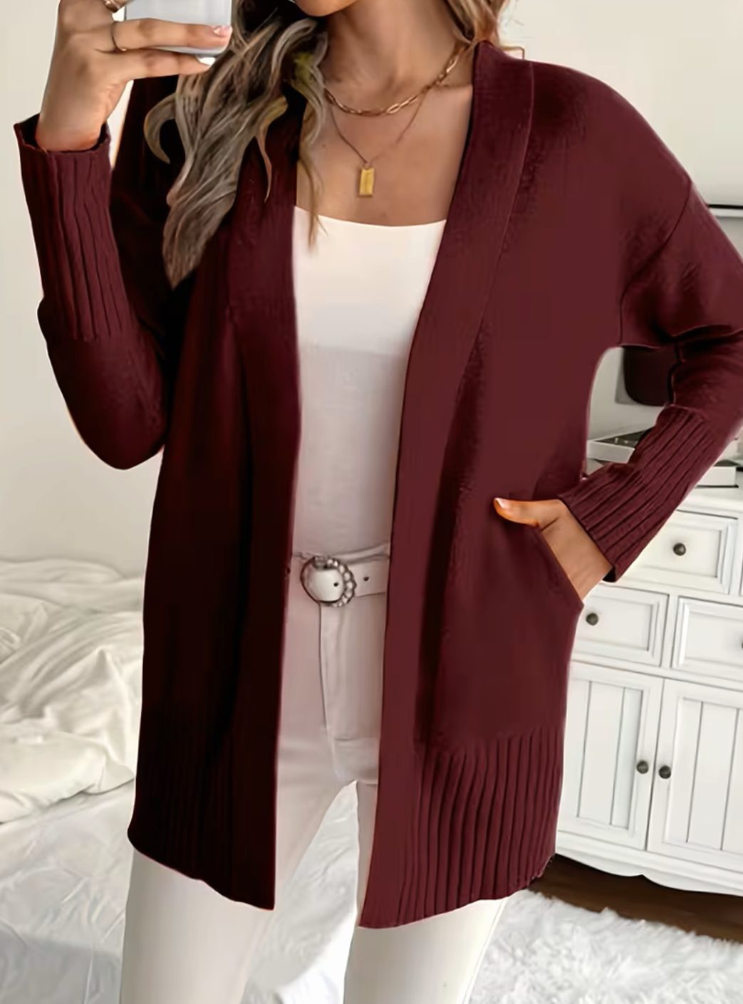 Cárdigan de punto para mujer, corte abierto y fit relajado. Estilizado, cómodo y versátil.