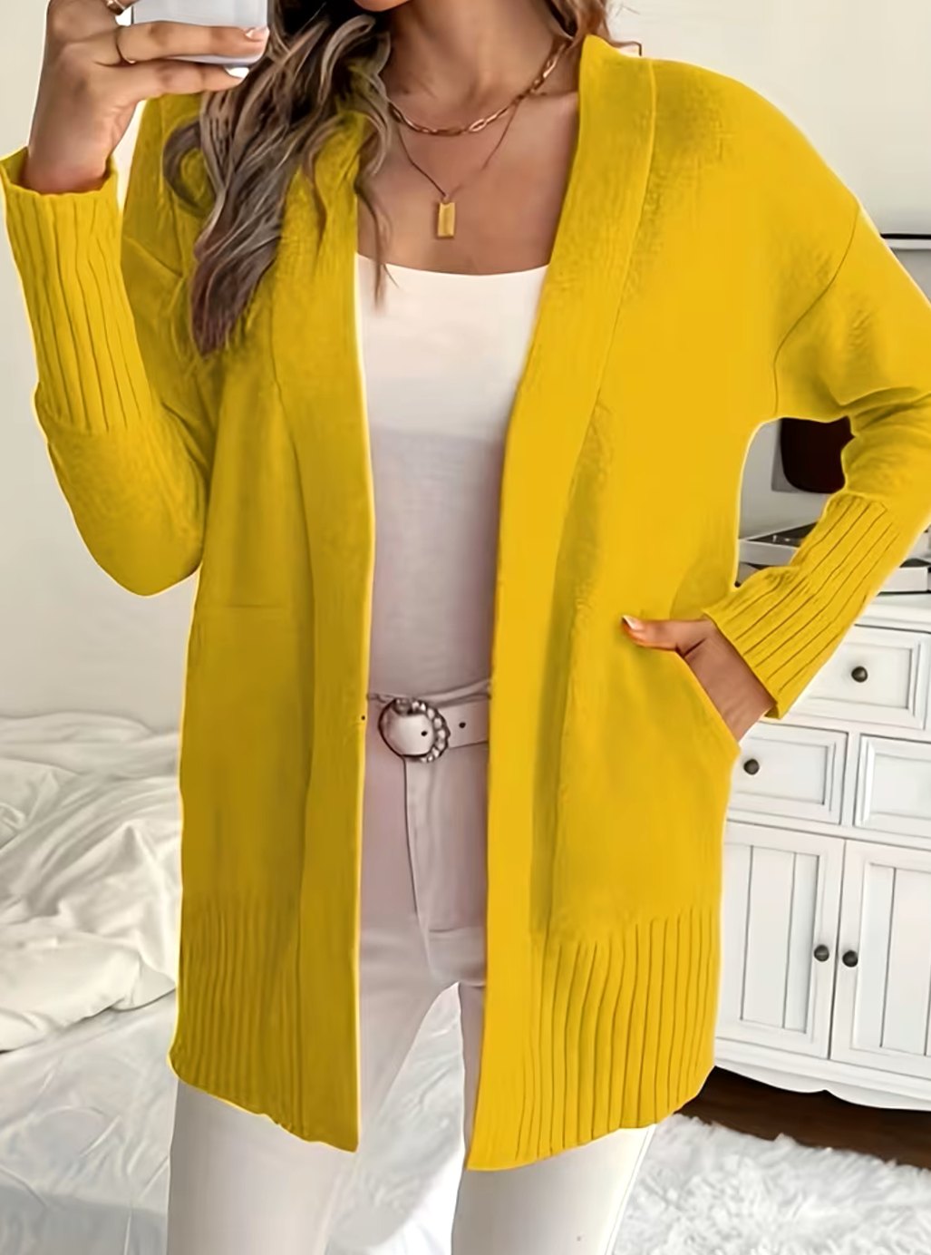 Cárdigan de punto abierto, mujer. Fit relajado, ideal para un estilo casual y cómodo de otoño.