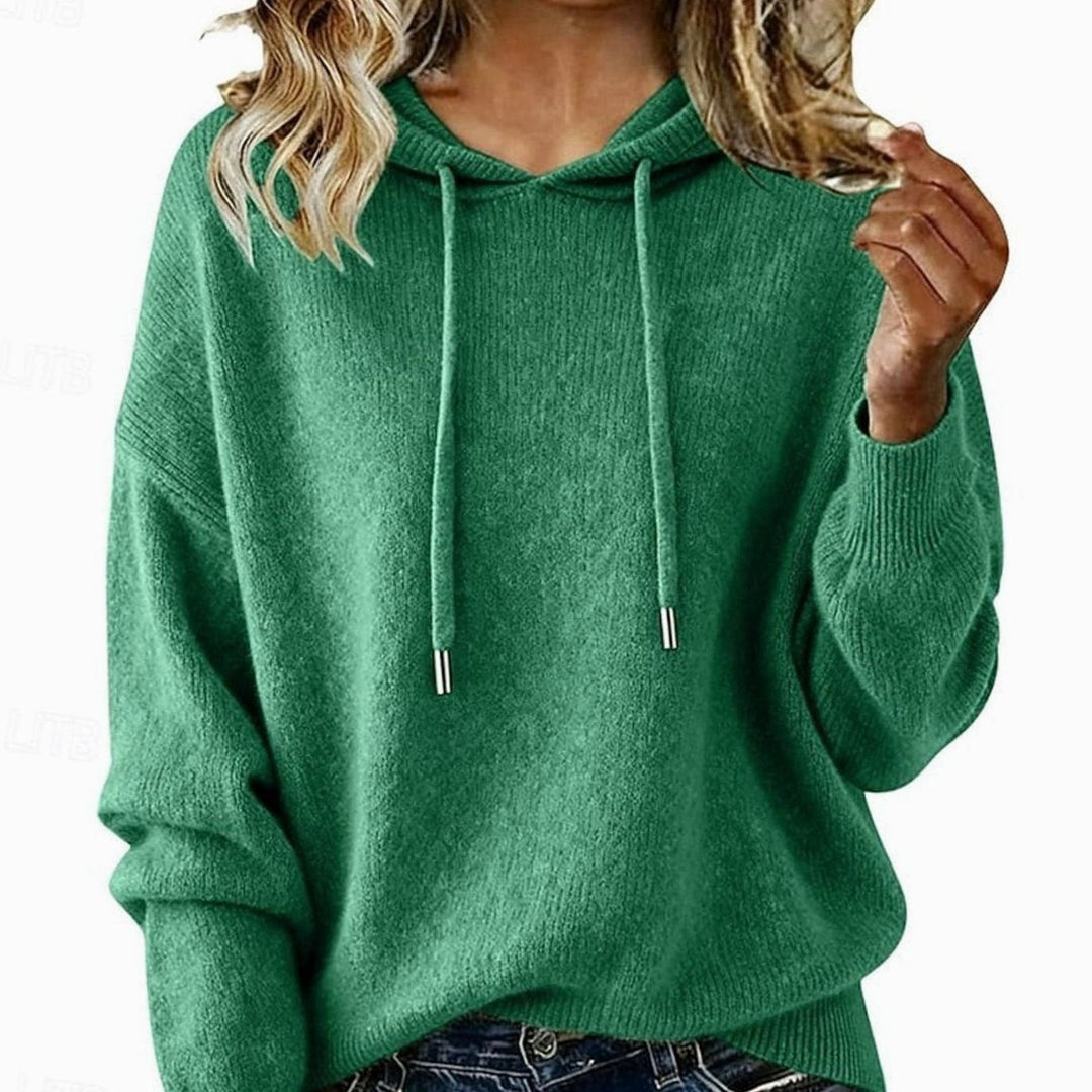 Sudadera de mujer con capucha y cordón en corte relajado. Ideal para estilo casual y ropa cómoda de otoño.