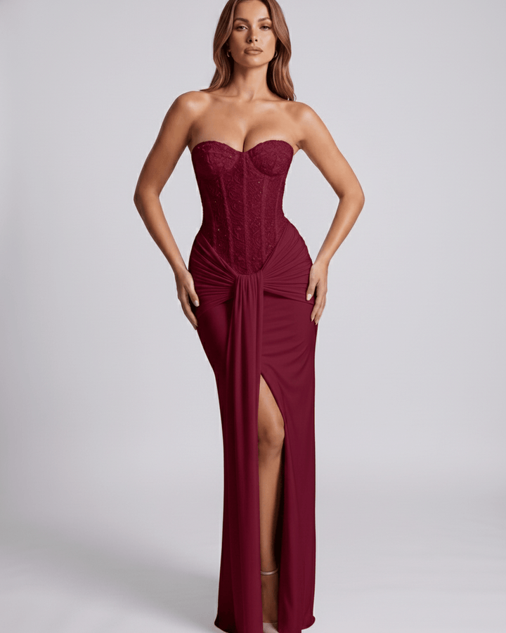 Glamuroso vestido maxi formal con corsé, sin mangas, perfecto para galas y noches especiales.