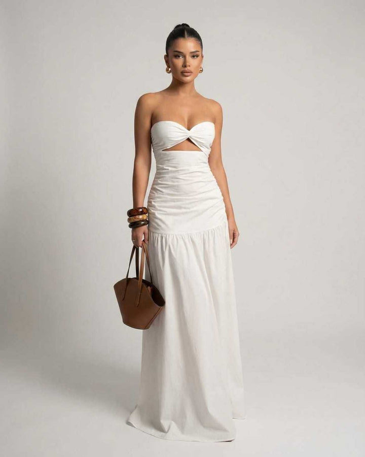 Vestido maxi blanco sin tirantes para mujer, elegante y moderno, con corte en la cintura, ideal para verano.