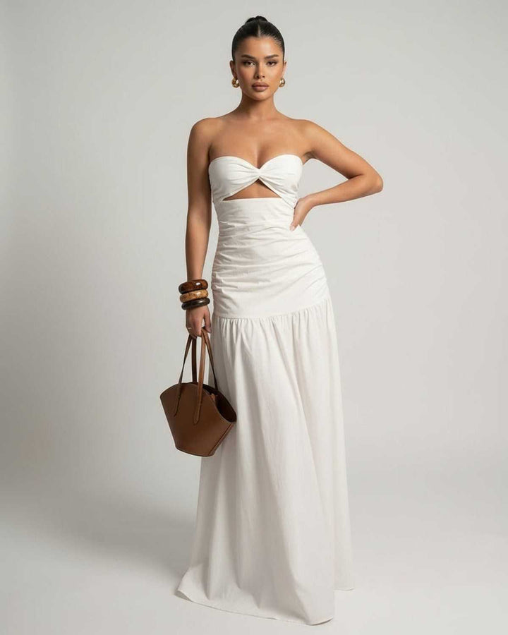 Vestido blanco de mujer, maxi y sin tirantes, con corte en la cintura, moda femenina versátil y moderna.