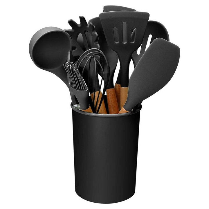 Set de 11 utensilios de cocina de silicona y madera, ideal para tu hogar.