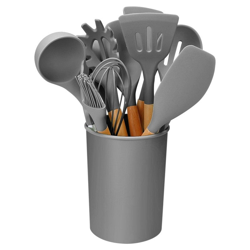 Accesorios de cocina de silicona resistente al calor, mangos de madera y libre de BPA.